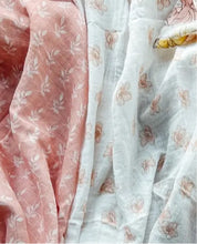 Load image into Gallery viewer, Aden + Anais Silky Soft Muslin Cotton Swaddle Blanket in Pink with White Leaves Print